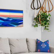 Rise geometric abstract painting 20x40 displayed in modern living room interior by Shilo Ratner